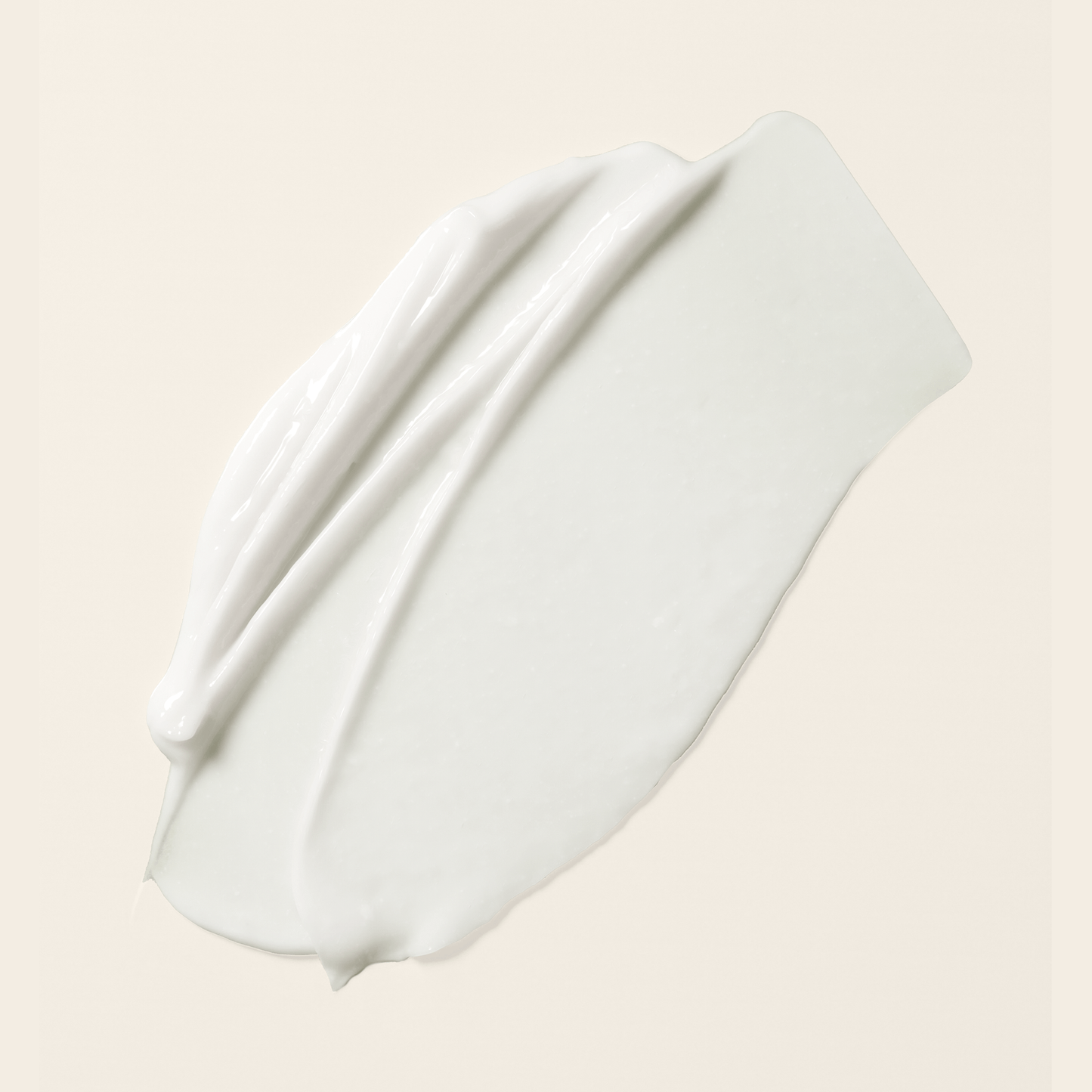 Zachte, niet-schuimende crèmespoeling die reinigt zonder vocht te onttrekken en de hydratatie van de krullen versterkt.